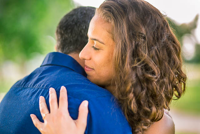 The bride holding her groom at the Yarkon Park in Tel Aviv, Israel.