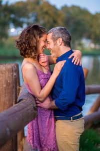 Candid photo of the engaged couple at the Yarkon River in Tel Aviv, Israel.