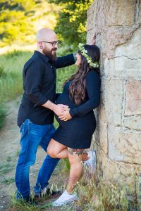 Couple leans into each other at Knapp's Castle photoshoot.