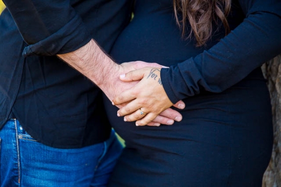 Couple leans into each other at Knapp