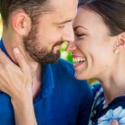 Couple embracing and laughing at their Goleta engagement photoshoot.