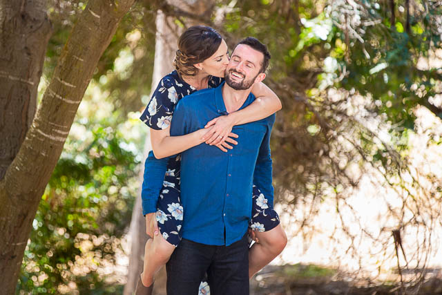 Couple embracing at the Ellwood Butterfly Preserve.
