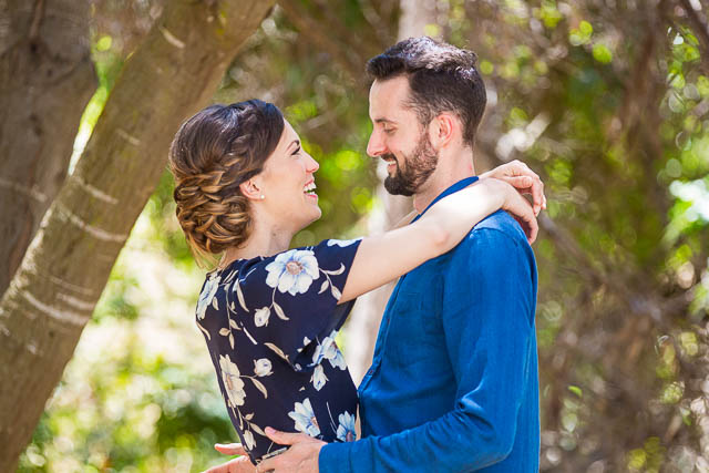 Couple embracing at the Ellwood Butterfly Preserve.