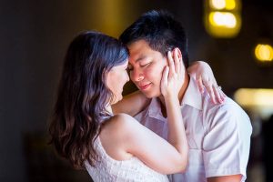 Bride and groom holding each other inside the Santa Barbara Courthouse.