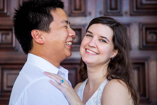 Bride and groom smiling at the Santa Barbara Courthouse.