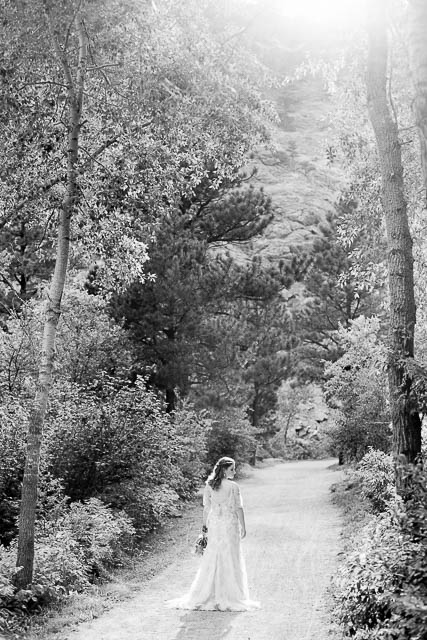 Bride posing on a trail in Boulder, Colorado.