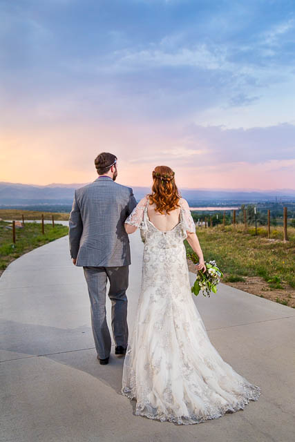 Sunset photos overlooking the Colorado Rockies with bride and groom.