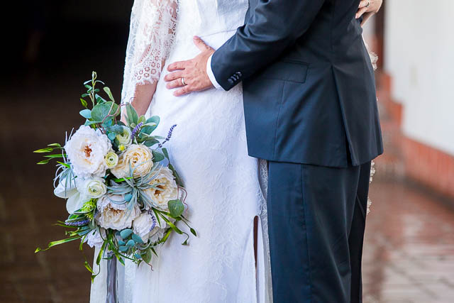 Couple embracing after their Santa Barbara Courthouse elopement.