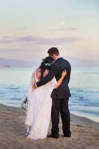 Bride and groom unset photos at Butterfly Beach in Santa Barbara.