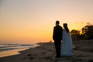 Bride and groom unset photos at Butterfly Beach in Santa Barbara.