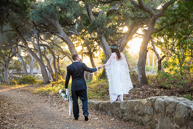 Newlyweds walking around at Ennisbrook trails during their Santa Barbara elopement.