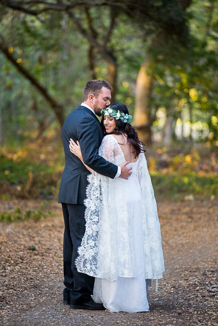 Newlyweds walking around at Ennisbrook trails.