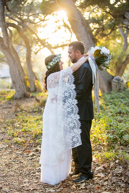 Newlyweds walking around at Ennisbrook trails.