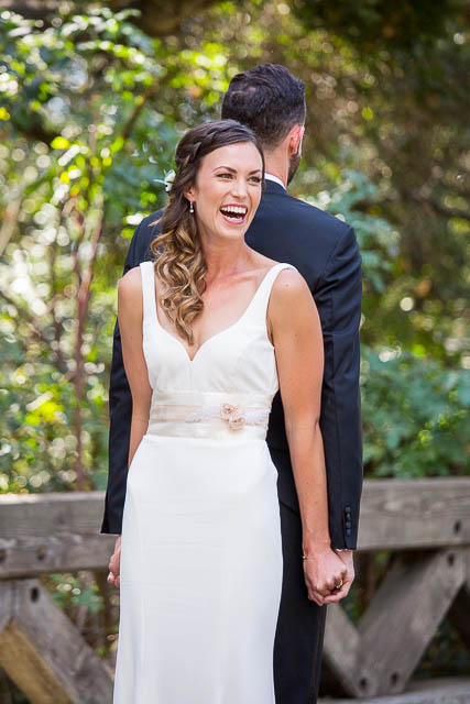 Bride and groom prepare for their first look at Glen Annie Golf Club in Goleta, CA.