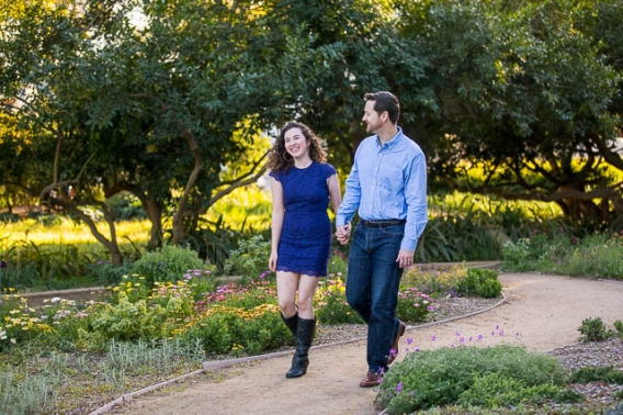 Engaged couple walking around Alice Keck Park in Santa Barbara, Califronia.