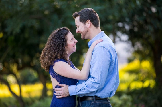 Bride and groom laughing at Alice Keck Park Memorial Gardens in Santa Barbara, California.