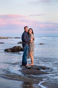 Sunset photos of engaged couple at Hendry's Beach.