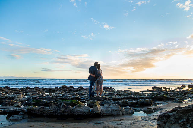 The newly engaged couple during their Hendry's Beach engagement photos.
