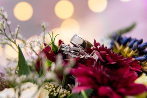 Photos of the wedding rings in the bridal bouquet during the Rotorua New Zealand wedding.