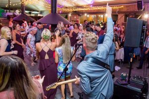 Guests dancing during the Skyline Rotorua wedding reception.