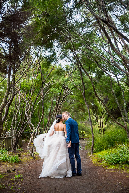 The newlyweds walking around the geothermal Kuirau Park in Rotorua, New Zealand.
