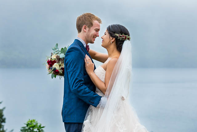 Bride and Groom enjoying the Blue and Green Lake viewing point during their New Zealand Rotorua Wedding