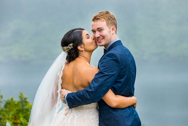 Bride and Groom enjoying the Blue and Green Lake viewing point in Rotorua, New Zealand.