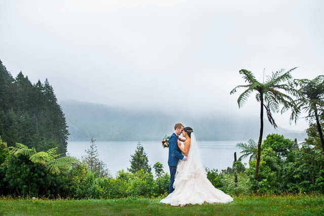Bride and Groom enjoying the Blue and Green Lake viewing point in Rotorua, New Zealand.