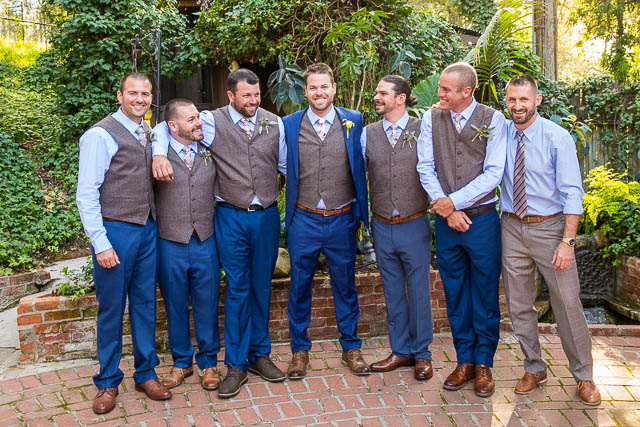 Groom and groomsmen pose during the Ojai garden wedding.