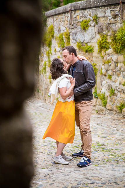 Castle Wedding photographs of couple walking together in the Cité de Carcassonne, a medieval fortress.