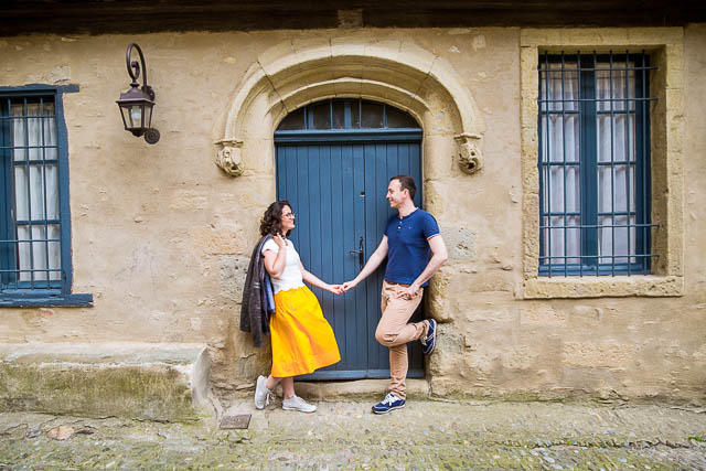 Engagement photographs captured in the Cité de Carcassonne, a medieval fortress.