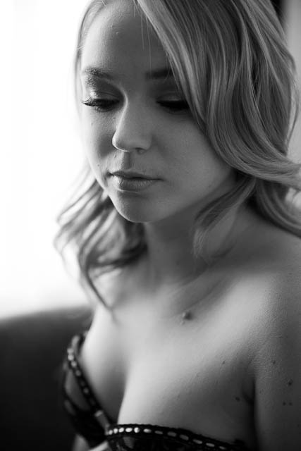 A black and white portrait of a blonde woman during her boudoir photoshoot in Los Angeles.