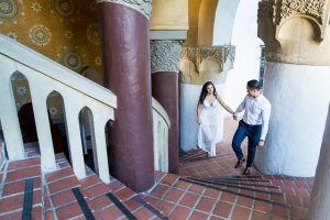Couple walking together in Los Angeles during their engagement photoshoot.