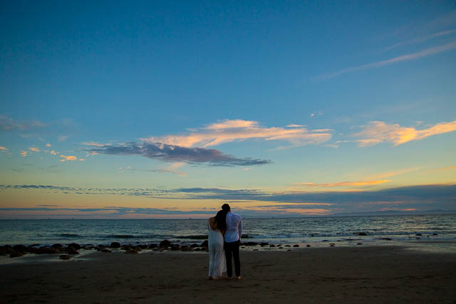 A silhouette photo of a couple during their engagement photoshoot at the beach in Santa Barbara, California.