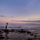 A silhouette photo of a couple during their engagement photoshoot at the beach in Santa Barbara, California.