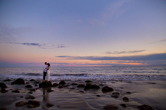 A silhouette photo of a couple during their engagement photoshoot at the beach in Santa Barbara, California.