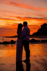 A silhouette photo of a couple during their engagement photoshoot at the beach in Santa Barbara, California.