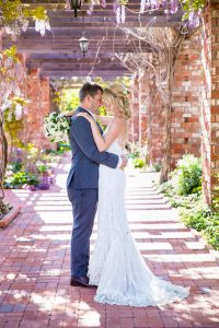 Bride and groom portraits at the Belmond El Encanto lilly pond.