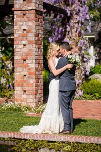 Groom and bride portraits at the Belmond El Encanto Lilly pond wedding.