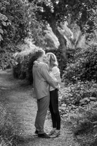 Lovers dancing together on the trail leading to the beach in Santa Barbara, California.