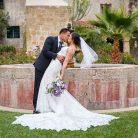 Newlyweds after their Mission Santa Barbara church wedding.