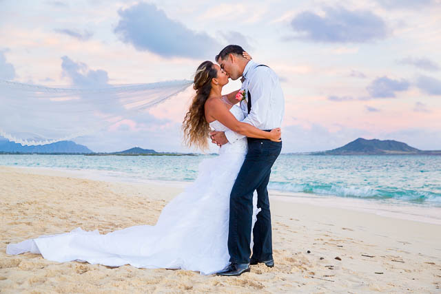 Sunset wedding photos at Lanikai Beach, Honolulu Hawaii wedding.