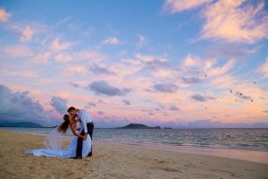 Sunset wedding photos at Lanikai Beach, Honolulu Hawaii wedding.