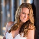 UCSB grad senior at the beach for her graduation photos.