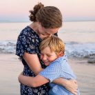 Family laughing during their beach family photoshoot in Santa Barbara.