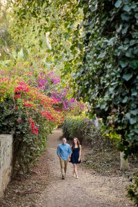Fiancé and Fiancée strolling together during their romantic Santa Barbara engagement photoshoot.