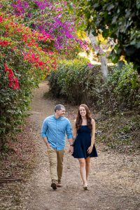 Fiancé and Fiancée strolling together during their romantic Santa Barbara engagement photoshoot.