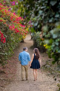 Fiancé and Fiancée strolling together during their romantic Santa Barbara engagement photoshoot.