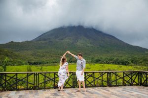 Newlyweds photos in front of Arenal Volcano in La Fortuna, Costa Rica.