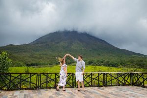 Newlyweds photos in front of Arenal Volcano in La Fortuna, Costa Rica.